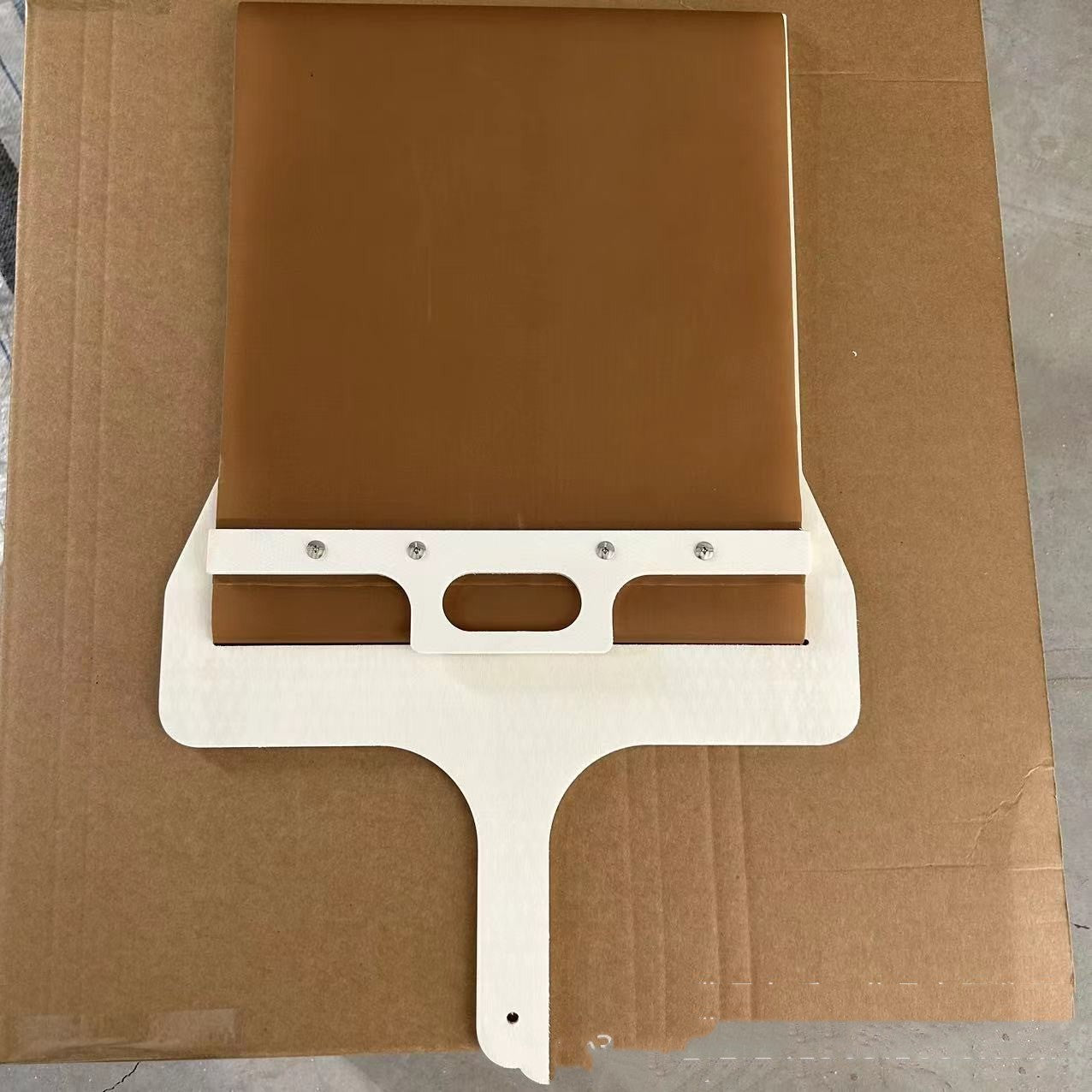 Kitchen Three sizes of sliding pizza peel shovels with wooden handles, designed for easy pizza transfer and storage.